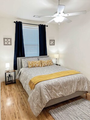 Bedroom 1 queen bed, large closet space, black out blinds