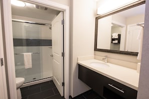 Freshen up in the bathroom after a day of adventure.