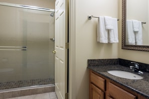 Get ready for your day in the lovely bathroom.