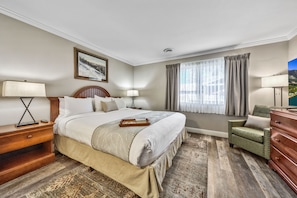 A peaceful retreat with soft bedding, warm lighting, and a spacious layout designed for ultimate comfort and relaxation.