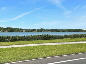 A scenic lakeside trail with towering cypress, Spanish moss, and peaceful wildlife. Enjoy a tranquil stroll, sunrise jog, or quiet nature escape while admiring the lake's natural beauty and wildlife. 