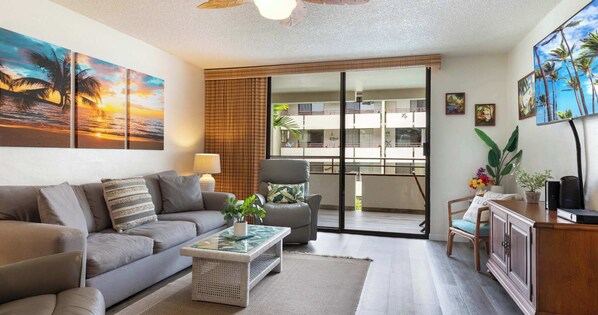Curl up in the breezy living room & stream your favorites on the smart TV