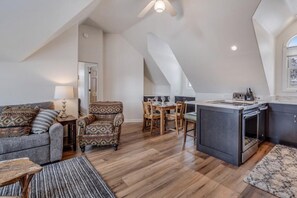 This stand-alone apartment sits above the garage. While it is located right next to the main house, it is a completely separate structure.
