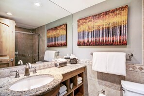 Prepare for the day in the modern bathroom.
