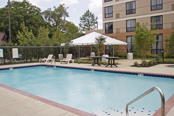Lounge around the pool after a day of adventure.