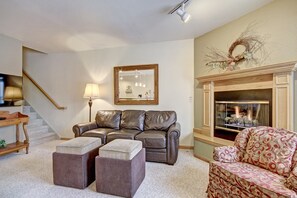 Sink into the comfortable sofas around the coffee table.