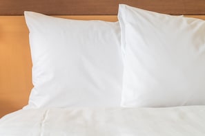 Sink into the luxurious bedding.