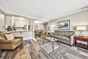 Spacious and elegantly designed, this open-concept living area blends comfort and style, creating the perfect setting for gathering and unwinding.