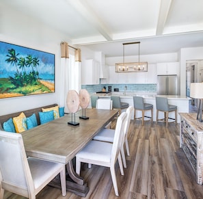 The dining area and kitchen island provide seating for you and all of your guests.