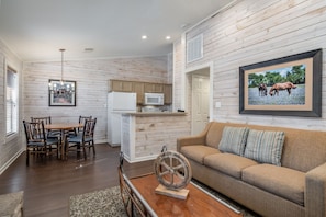 Sink into the cozy sofa after a day exploring the area.