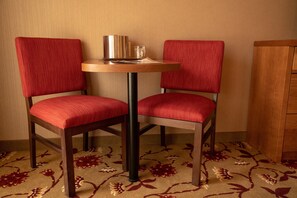 The dining table is the perfect place to enjoy a glass of wine at the end of the day.