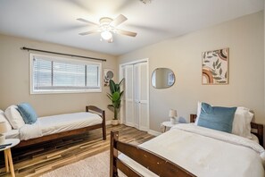 Bright bunk room designed for comfort, fun, and a great night's sleep.