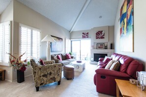 Spacious comfort. We now have L-shape sofa with 2 recliners, & 55" Roku TV.  