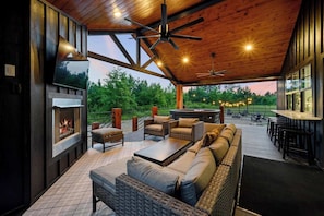 Expansive deck to relax with your friends and family! Hot tub, gas fireplace, Smart TV, hard-lined propane grill, and lots of seating!