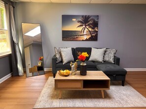 Relax in this cozy room with a sectional sofa