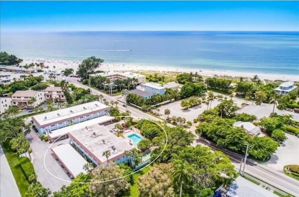 Easy walk to the sugary white sand beaches.