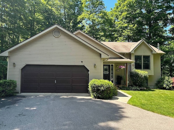 Summit House, located on 15 acres of secluded and private rolling hardwoods.