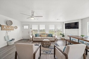 Curl up with a good book in the inviting living room