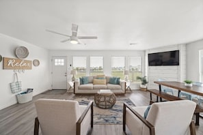 Curl up with a good book in the inviting living room