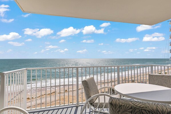Soak up the Florida sun from your private 7th-floor balcony—this southern corner condo offers stunning ocean views and breezy seating with a view