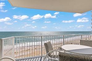 Soak up the Florida sun from your private 7th-floor balcony—this southern corner condo offers stunning ocean views and breezy seating with a view