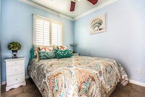 Queen bed in bedroom