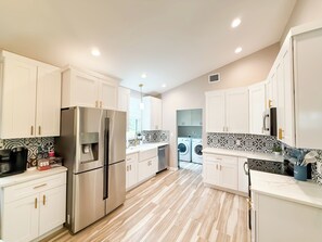 Kitchen: Fully stocked and spacious with everything you need to cook with ease!