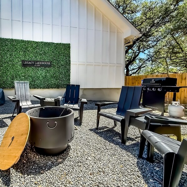 Enjoy the smokeless firepit with seating for 8 & 4 burner propane grill.