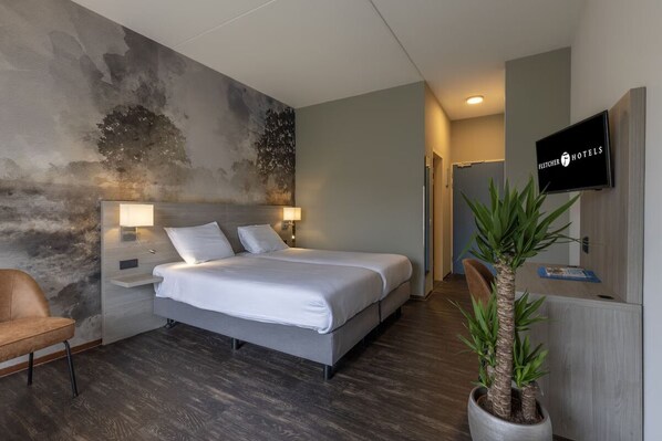 Unit with 2 single beds. Exact unit will be assigned upon arrival. Views, colors, and decor may vary.