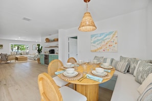 Expandable kitchen table with built in booth