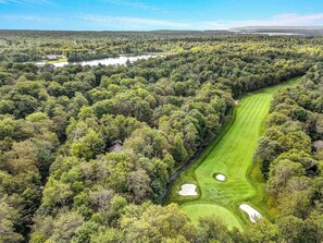 Enjoy the golf course view while enjoying your morning coffee on our of our decks.