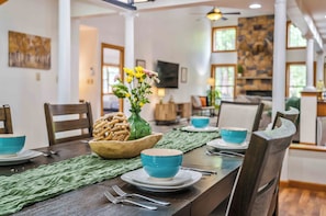 Gather your group around the heart of the home—our elegant dining hall, designed to seat 6 to 8 guests comfortably. Whether you're sharing a homemade breakfast, a holiday dinner, or late-night takeout, this space brings everyone together. With warm lighting, tasteful decor, and views into the living areas, it’s the perfect setting for meaningful conversations, laughter, and unforgettable meals.