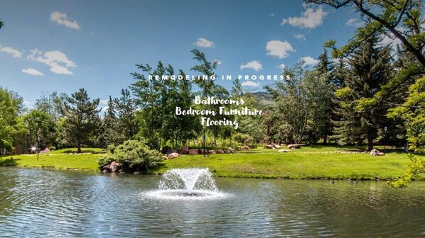 Relax by the tranquil pond just steps from your mountain retreat.