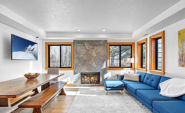 Enjoy meals with a view in this bright, window-lined dining area.