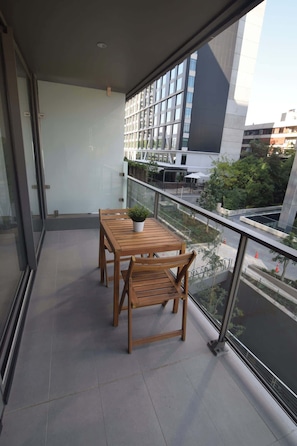 Enjoy a cozy balcony with a view, perfect for morning coffee or evening relaxation.