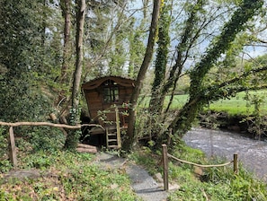 Romany caravan. (For guests exclusive use, on private river bank).