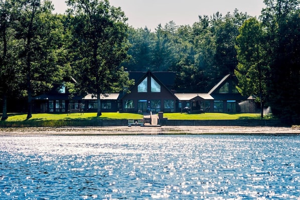 Tranquil lakeside retreat surrounded by nature.