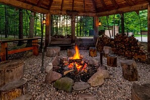 Cozy campfire spot to gather and relax.
