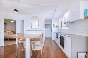Whether you're sipping morning espresso from the Nespresso machine or enjoying a quick bite, the breakfast bar offers a casual spot to start the day.