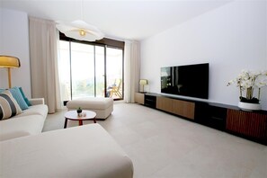 Bright and spacious lounge area with access to the terrace
