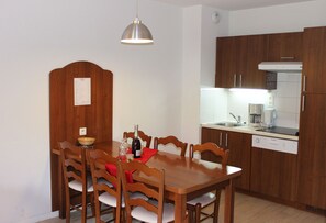 Reconnect with loved ones over a meal at the dining table.