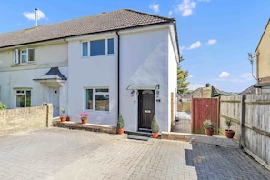 Ideally situated with a parking space for 2 small cars or 1 big van