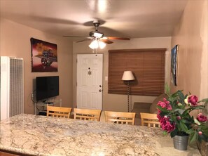 Big dining bar permits viewing ocean or living room.  Granite countertops.
