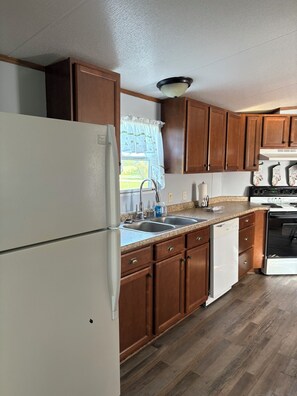 Lots of counter space in this ready to make a meal kitchen.