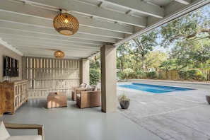 Enjoy the outdoor space - Covered porch with seating and TV!