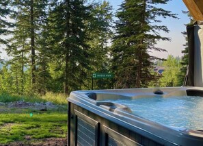 Enjoy a well deserved soak in this amazing hot tub after a long day outdoors | Exterior