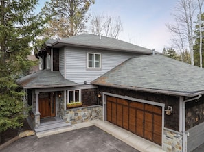 Heated Garage Parking for 1 Vehicle and Additional Driveway Parking