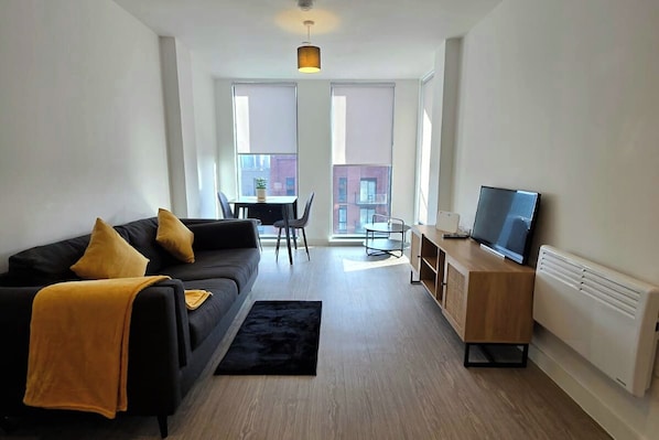 Open space living room with lots of light coming through