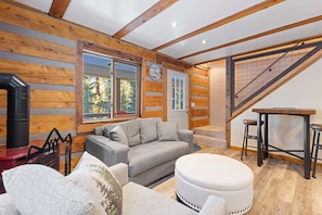 Living room: Main floor, Gas fireplace, Smart TV, bar seating