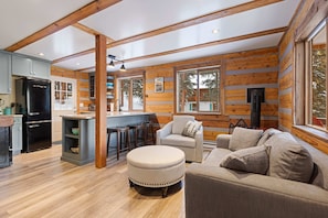 Living room: Main floor, Gas fireplace, Smart TV, bar seating